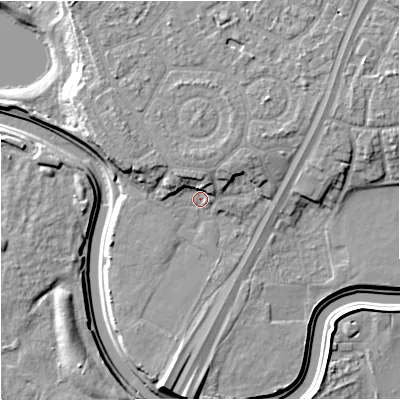 Shaded relief map of the ground around M217PU, computed from Environment Agency LiDAR. The ground here sits at about 29 m above sea level and falls 11 m across the surrounding 800 m. Surface water reaching this point runs off ground lying to the north-west, 4.6 m higher.