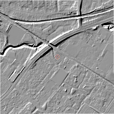 Shaded relief map of the ground around M217SZ, computed from Environment Agency LiDAR. The ground here sits at about 29 m above sea level and falls 11 m across the surrounding 800 m. Surface water reaching this point runs off ground lying to the south-east, 3.2 m higher.