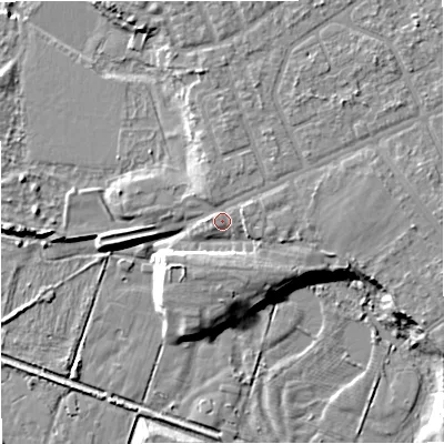 Shaded relief map of the ground around M218DN, computed from Environment Agency LiDAR. The ground here sits at about 29 m above sea level and falls 9 m across the surrounding 800 m. Surface water reaching this point runs off ground lying to the east, 3.1 m higher.