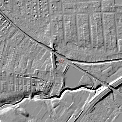 Shaded relief map of the ground around M218PZ, computed from Environment Agency LiDAR. The ground here sits at about 29 m above sea level and falls 11 m across the surrounding 800 m. Surface water reaching this point runs off ground lying to the east-south-east, 7.8 m higher.