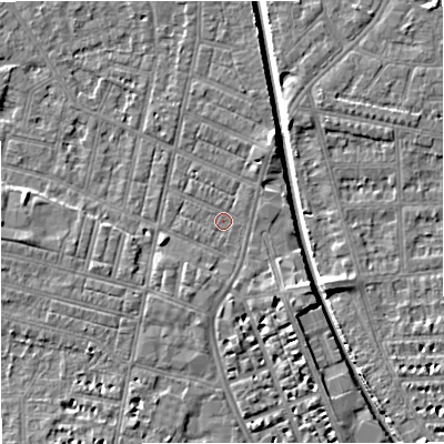 Shaded relief map of the ground around M219GG, computed from Environment Agency LiDAR. The ground here sits at about 27 m above sea level and falls 7 m across the surrounding 800 m. Surface water reaching this point runs off ground lying to the east-north-east, 0.7 m higher.