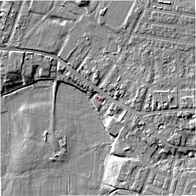 Shaded relief map of the ground around M219JN, computed from Environment Agency LiDAR. The ground here sits at about 24 m above sea level and falls 9 m across the surrounding 800 m. Surface water reaching this point runs off ground lying to the north-west, 3.4 m higher.