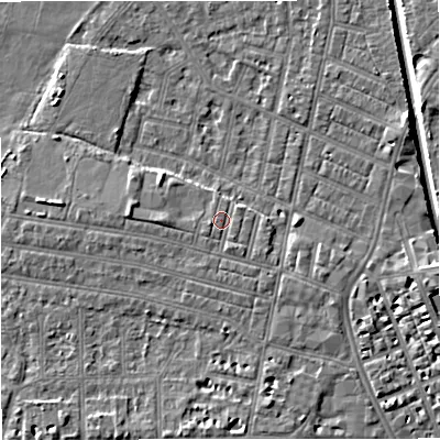 Shaded relief map of the ground around M219NQ, computed from Environment Agency LiDAR. The ground here sits at about 28 m above sea level and falls 6 m across the surrounding 800 m. Surface water reaching this point runs off ground lying to the south-west, 1.1 m higher.