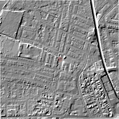 Shaded relief map of the ground around M219QD, computed from Environment Agency LiDAR. The ground here sits at about 27 m above sea level and falls 7 m across the surrounding 800 m. Surface water reaching this point runs off ground lying to the south-south-west, 2.1 m higher.