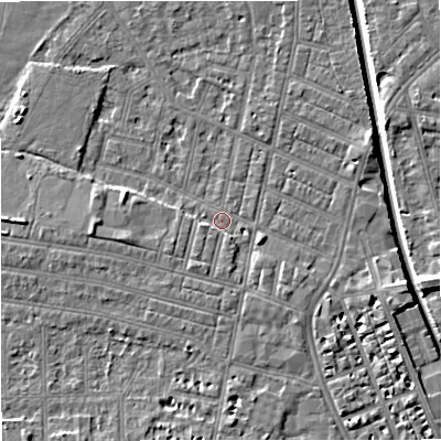 Shaded relief map of the ground around M219WQ, computed from Environment Agency LiDAR. The ground here sits at about 27 m above sea level and falls 7 m across the surrounding 800 m. Surface water reaching this point runs off ground lying to the east-north-east, 3.4 m higher.