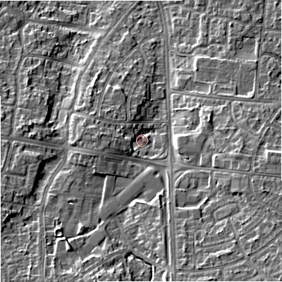 Shaded relief map of the ground around M228AH, computed from Environment Agency LiDAR. The ground here sits at about 48 m above sea level and falls 13 m across the surrounding 800 m. Surface water reaching this point runs off ground lying to the west, 5.1 m higher.