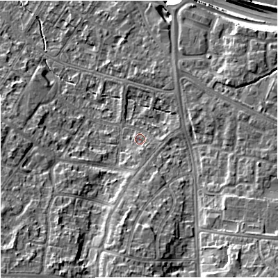 Shaded relief map of the ground around M228DX, computed from Environment Agency LiDAR. The ground here sits at about 43 m above sea level and falls 16 m across the surrounding 800 m. Surface water reaching this point runs off ground lying to the south, 2.1 m higher.