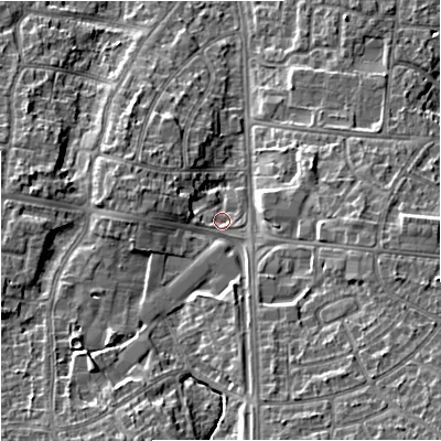 Shaded relief map of the ground around M228UG, computed from Environment Agency LiDAR. The ground here sits at about 48 m above sea level and falls 14 m across the surrounding 800 m. Surface water reaching this point runs off ground lying to the south-south-west, 7.0 m higher.