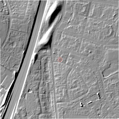 Shaded relief map of the ground around M229GJ, computed from Environment Agency LiDAR. The ground here sits at about 52 m above sea level and falls 15 m across the surrounding 800 m. Surface water reaching this point runs off ground lying to the south-east, 6.6 m higher.