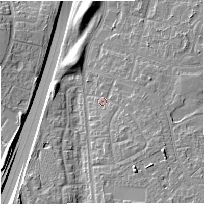 Shaded relief map of the ground around M229QJ, computed from Environment Agency LiDAR. The ground here sits at about 52 m above sea level and falls 15 m across the surrounding 800 m. Surface water reaching this point runs off ground lying to the south-east, 6.0 m higher.