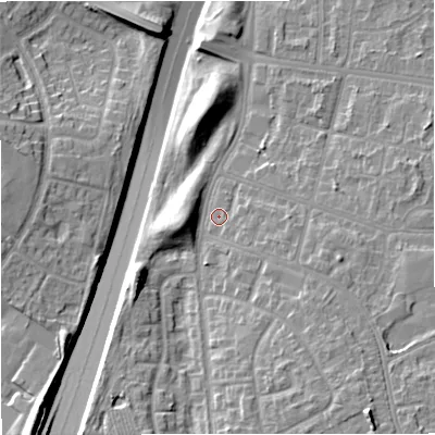 Shaded relief map of the ground around M229RA, computed from Environment Agency LiDAR. The ground here sits at about 51 m above sea level and falls 16 m across the surrounding 800 m. Surface water reaching this point runs off ground lying to the south-east, 2.3 m higher.
