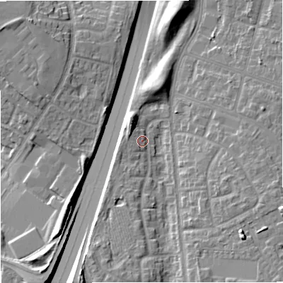 Shaded relief map of the ground around M229RX, computed from Environment Agency LiDAR. The ground here sits at about 52 m above sea level and falls 16 m across the surrounding 800 m. Surface water reaching this point runs off ground lying to the east-south-east, 10.8 m higher.