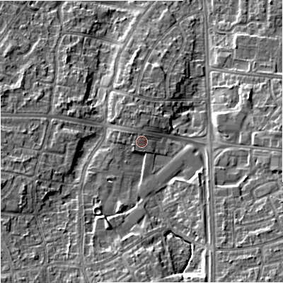 Shaded relief map of the ground around M229UE, computed from Environment Agency LiDAR. The ground here sits at about 51 m above sea level and falls 14 m across the surrounding 800 m. Surface water reaching this point runs off ground lying to the north-north-west, 0.9 m higher.