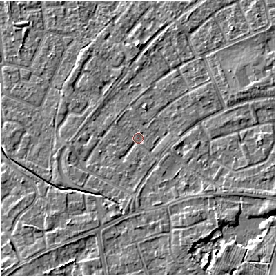 Shaded relief map of the ground around M230AL, computed from Environment Agency LiDAR. The ground here sits at about 29 m above sea level and falls 5 m across the surrounding 800 m. Surface water reaching this point runs off ground lying to the south-east, 3.2 m higher.
