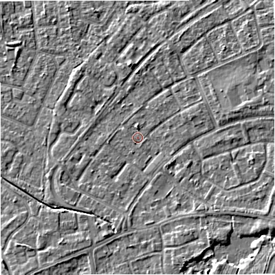 Shaded relief map of the ground around M230JW, computed from Environment Agency LiDAR. The ground here sits at about 29 m above sea level and falls 5 m across the surrounding 800 m. Surface water reaching this point runs off ground lying to the east-north-east, 2.4 m higher.