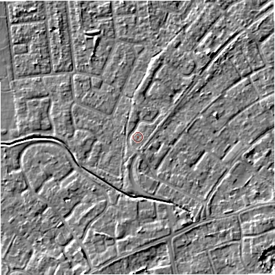 Shaded relief map of the ground around M230QE, computed from Environment Agency LiDAR. The ground here sits at about 29 m above sea level and falls 5 m across the surrounding 800 m. Surface water reaching this point runs off ground lying to the south-south-east, 1.2 m higher.