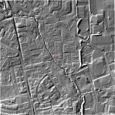 Shaded relief map of the ground around M239GW, computed from Environment Agency LiDAR. The ground here sits at about 33 m above sea level and falls 11 m across the surrounding 800 m. Surface water reaching this point runs off ground lying to the east, 0.6 m higher.