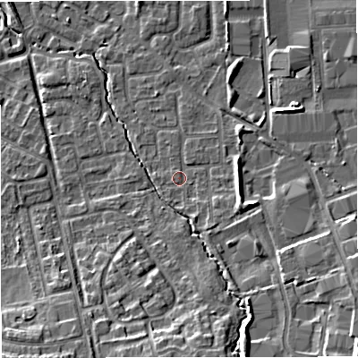 Shaded relief map of the ground around M239PR, computed from Environment Agency LiDAR. The ground here sits at about 33 m above sea level and falls 11 m across the surrounding 800 m. Surface water reaching this point runs off ground lying to the south-east, 7.7 m higher.