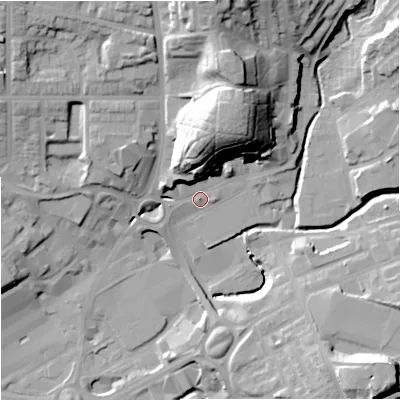 Shaded relief map of the ground around M241AG, computed from Environment Agency LiDAR. The ground here sits at about 83 m above sea level and falls 34 m across the surrounding 800 m. Surface water reaching this point runs off ground lying to the north, 28.5 m higher.