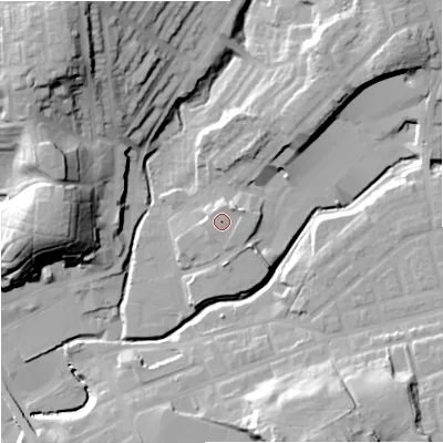 Shaded relief map of the ground around M242HD, computed from Environment Agency LiDAR. The ground here sits at about 89 m above sea level and falls 38 m across the surrounding 800 m. Surface water reaching this point runs off ground lying to the north-east, 1.6 m higher.