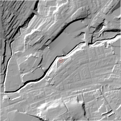Shaded relief map of the ground around M242HP, computed from Environment Agency LiDAR. The ground here sits at about 89 m above sea level and falls 27 m across the surrounding 800 m. Surface water reaching this point runs off ground lying to the north-north-east, 16.7 m higher.