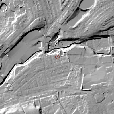Shaded relief map of the ground around M242JD, computed from Environment Agency LiDAR. The ground here sits at about 92 m above sea level and falls 27 m across the surrounding 800 m. Surface water reaching this point runs off ground lying to the east-north-east, 4.5 m higher.