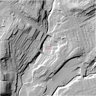 Shaded relief map of the ground around M242SX, computed from Environment Agency LiDAR. The ground here sits at about 88 m above sea level and falls 33 m across the surrounding 800 m. Surface water reaching this point runs off ground lying to the west-north-west, 30.1 m higher.
