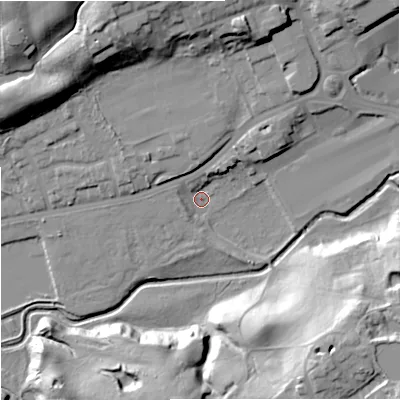 Shaded relief map of the ground around M244FA, computed from Environment Agency LiDAR. The ground here sits at about 74 m above sea level and falls 31 m across the surrounding 800 m. Surface water reaching this point runs off ground lying to the north-north-east, 10.2 m higher.
