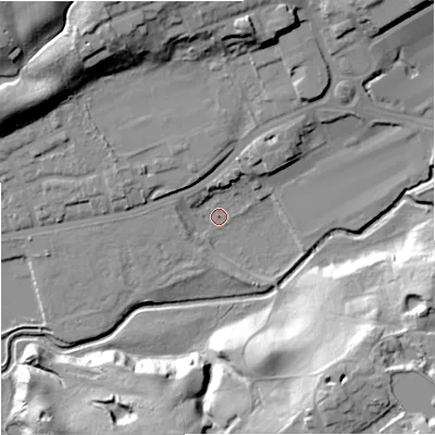 Shaded relief map of the ground around M244FE, computed from Environment Agency LiDAR. The ground here sits at about 74 m above sea level and falls 34 m across the surrounding 800 m. Surface water reaching this point runs off ground lying to the west-north-west, 3.2 m higher.
