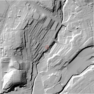 Shaded relief map of the ground around M246AG, computed from Environment Agency LiDAR. The ground here sits at about 91 m above sea level and falls 34 m across the surrounding 800 m. Surface water reaching this point runs off ground lying to the west-north-west, 24.1 m higher.