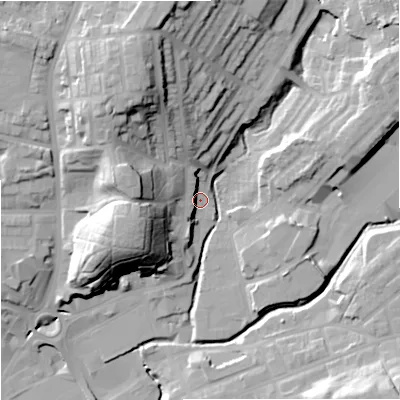 Shaded relief map of the ground around M246BR, computed from Environment Agency LiDAR. The ground here sits at about 85 m above sea level and falls 37 m across the surrounding 800 m. Surface water reaching this point runs off ground lying to the north-north-west, 30.1 m higher.
