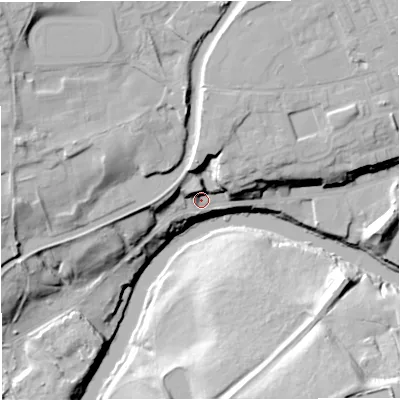Shaded relief map of the ground around M263SB, computed from Environment Agency LiDAR. The ground here sits at about 67 m above sea level and falls 34 m across the surrounding 800 m. Surface water reaching this point runs off ground lying to the north-west, 9.7 m higher.