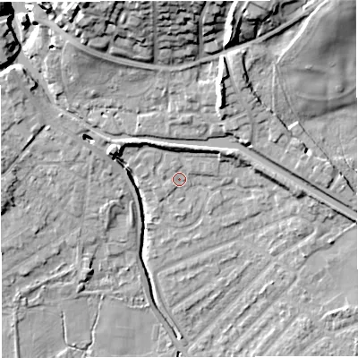 Shaded relief map of the ground around M282PE, computed from Environment Agency LiDAR. The ground here sits at about 23 m above sea level and falls 22 m across the surrounding 800 m. Surface water reaching this point runs off ground lying to the north-west, 3.9 m higher.