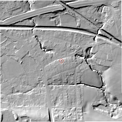 Shaded relief map of the ground around M282RX, computed from Environment Agency LiDAR. The ground here sits at about 54 m above sea level and falls 24 m across the surrounding 800 m. Surface water reaching this point runs off ground lying to the south-west, 2.4 m higher.