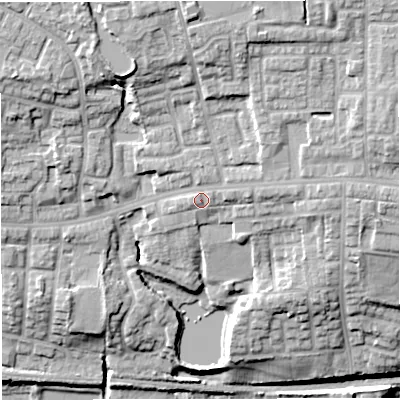 Shaded relief map of the ground around M283HE, computed from Environment Agency LiDAR. The ground here sits at about 85 m above sea level and falls 27 m across the surrounding 800 m. Surface water reaching this point runs off ground lying to the north-north-east, 8.8 m higher.