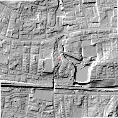 Shaded relief map of the ground around M283PN, computed from Environment Agency LiDAR. The ground here sits at about 82 m above sea level and falls 24 m across the surrounding 800 m. Surface water reaching this point runs off ground lying to the west-south-west, 2.4 m higher.