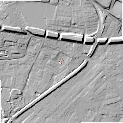 Shaded relief map of the ground around M283UP, computed from Environment Agency LiDAR. The ground here sits at about 65 m above sea level and falls 27 m across the surrounding 800 m. Surface water reaching this point runs off ground lying to the north-north-east, 16.4 m higher.