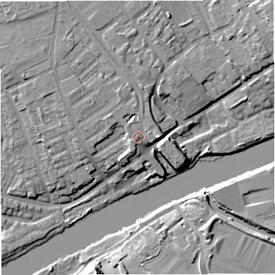 Shaded relief map of the ground around M307AE, computed from Environment Agency LiDAR. The ground here sits at about 26 m above sea level and falls 13 m across the surrounding 800 m. Surface water reaching this point runs off ground lying to the north-east, 1.8 m higher.
