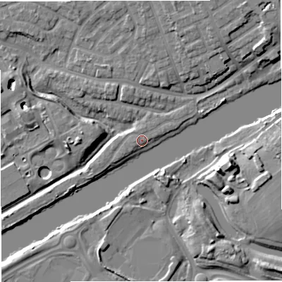 Shaded relief map of the ground around M307NJ, computed from Environment Agency LiDAR. The ground here sits at about 20 m above sea level and falls 16 m across the surrounding 800 m. Surface water reaching this point runs off ground lying to the west-south-west, 1.4 m higher.