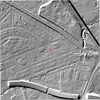 Shaded relief map of the ground around M308DA, computed from Environment Agency LiDAR. The ground here sits at about 22 m above sea level and falls 16 m across the surrounding 800 m. Surface water reaching this point runs off ground lying to the east, 2.7 m higher.