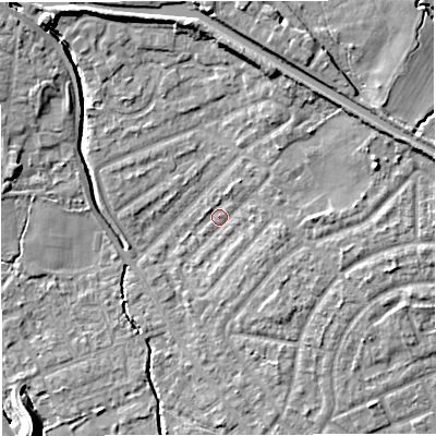 Shaded relief map of the ground around M308LE, computed from Environment Agency LiDAR. The ground here sits at about 21 m above sea level and falls 10 m across the surrounding 800 m. Surface water reaching this point runs off ground lying to the north-east, 5.7 m higher.