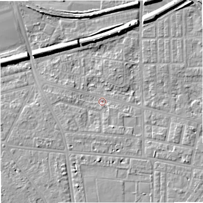 Shaded relief map of the ground around M320AU, computed from Environment Agency LiDAR. The ground here sits at about 23 m above sea level and falls 8 m across the surrounding 800 m. Surface water reaching this point runs off ground lying to the north-north-east, 7.9 m higher.