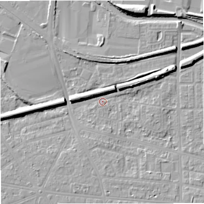 Shaded relief map of the ground around M320BE, computed from Environment Agency LiDAR. The ground here sits at about 23 m above sea level and falls 13 m across the surrounding 800 m. Surface water reaching this point runs off ground lying to the north-east, 8.4 m higher.