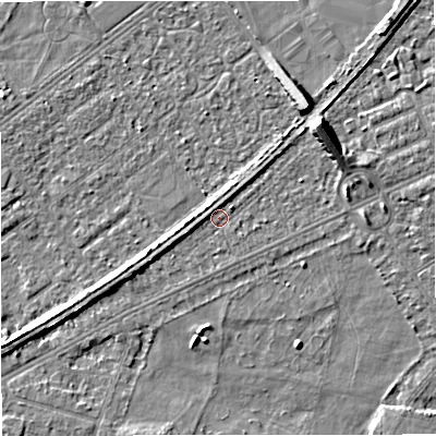 Shaded relief map of the ground around M328GG, computed from Environment Agency LiDAR. The ground here sits at about 27 m above sea level and falls 8 m across the surrounding 800 m. Surface water reaching this point runs off ground lying to the north-east, 6.6 m higher.