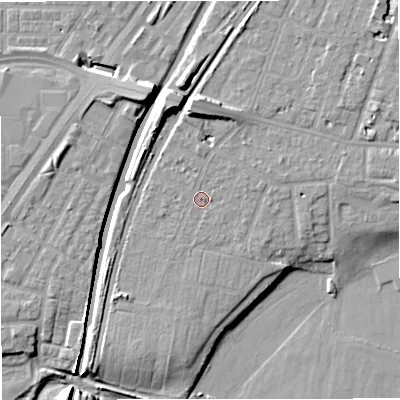 Shaded relief map of the ground around M328HX, computed from Environment Agency LiDAR. The ground here sits at about 26 m above sea level and falls 12 m across the surrounding 800 m. Surface water reaching this point runs off ground lying to the north, 6.5 m higher.