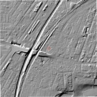 Shaded relief map of the ground around M328JN, computed from Environment Agency LiDAR. The ground here sits at about 27 m above sea level and falls 11 m across the surrounding 800 m. Surface water reaching this point runs off ground lying to the west-south-west, 5.3 m higher.