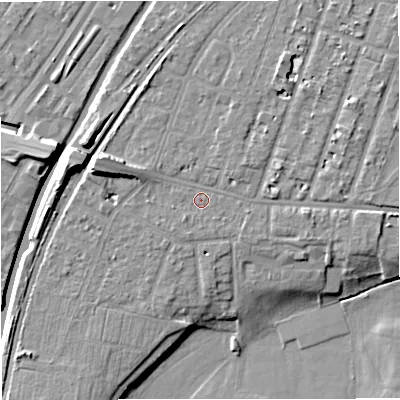 Shaded relief map of the ground around M328JP, computed from Environment Agency LiDAR. The ground here sits at about 26 m above sea level and falls 12 m across the surrounding 800 m. Surface water reaching this point runs off ground lying to the east, 1.6 m higher.