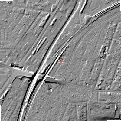 Shaded relief map of the ground around M328JR, computed from Environment Agency LiDAR. The ground here sits at about 27 m above sea level and falls 11 m across the surrounding 800 m. Surface water reaching this point runs off ground lying to the south-west, 5.3 m higher.
