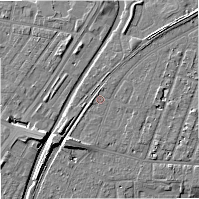 Shaded relief map of the ground around M328JS, computed from Environment Agency LiDAR. The ground here sits at about 27 m above sea level and falls 11 m across the surrounding 800 m. Surface water reaching this point runs off ground lying to the south-west, 5.3 m higher.