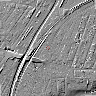 Shaded relief map of the ground around M328JW, computed from Environment Agency LiDAR. The ground here sits at about 27 m above sea level and falls 11 m across the surrounding 800 m. Surface water reaching this point runs off ground lying to the east, 0.9 m higher.
